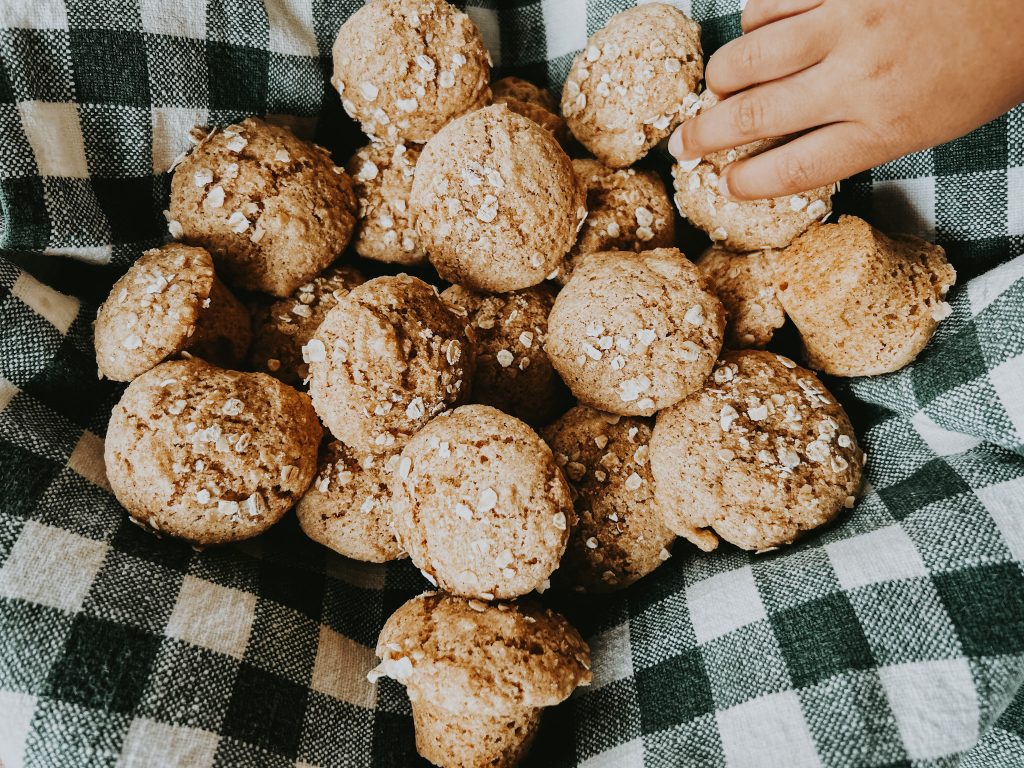 whole wheat muffins in a basket