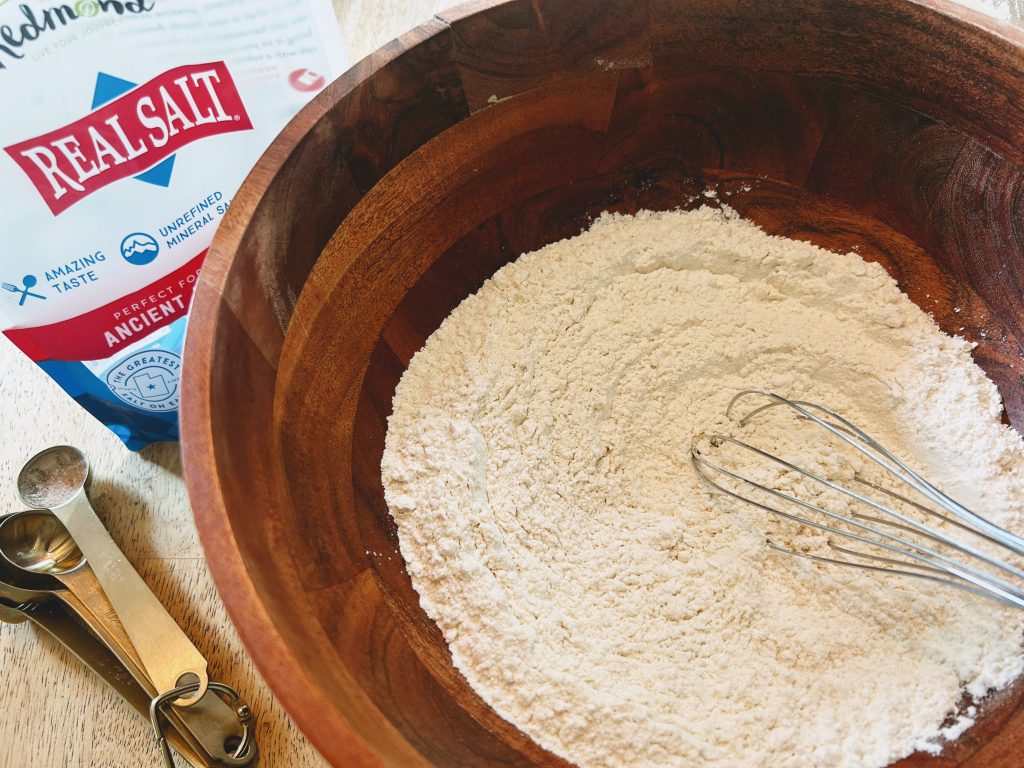 dry ingredients in mixing bowl for easy sourdough lemon coconut balls