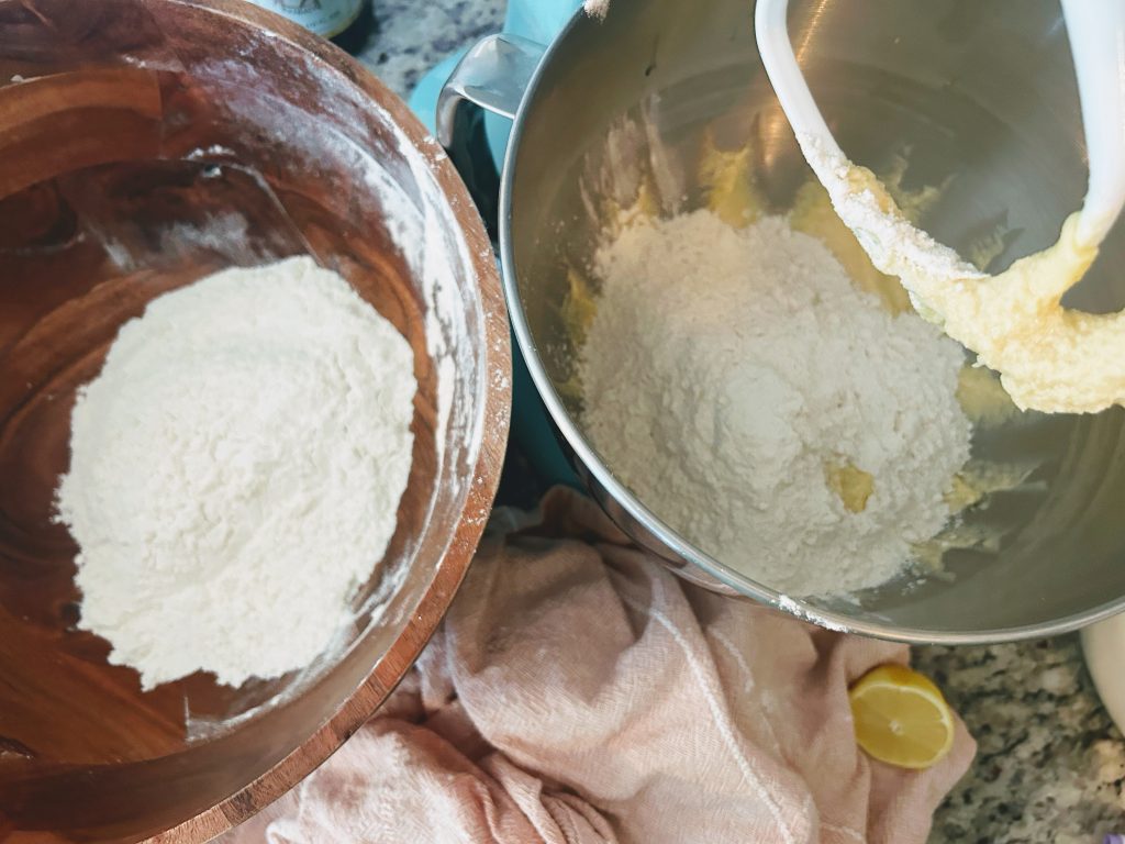 combining wet and dry ingredients for easy sourdough lemon coconut balls