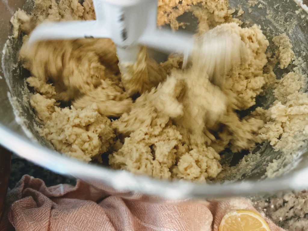 mixing dry and wet ingredients in a stand mixer