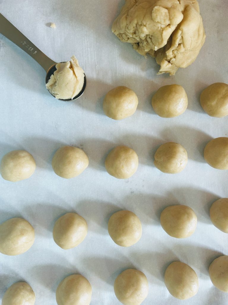 shaping cookie dough for easy sourdough lemon coconut balls