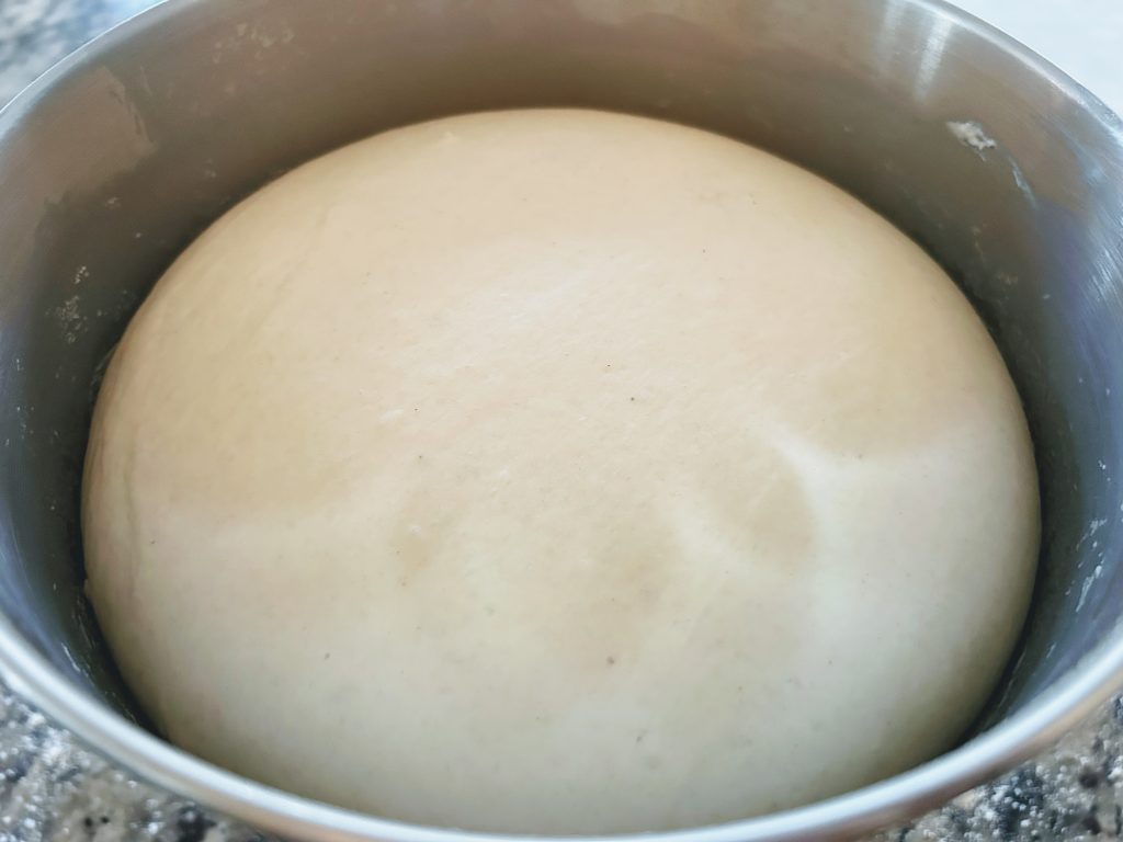 risen dough ball for sourdough pull-apart christmas tree rolls